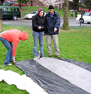 Paul Cooper (right) supervising lawn fish construction.